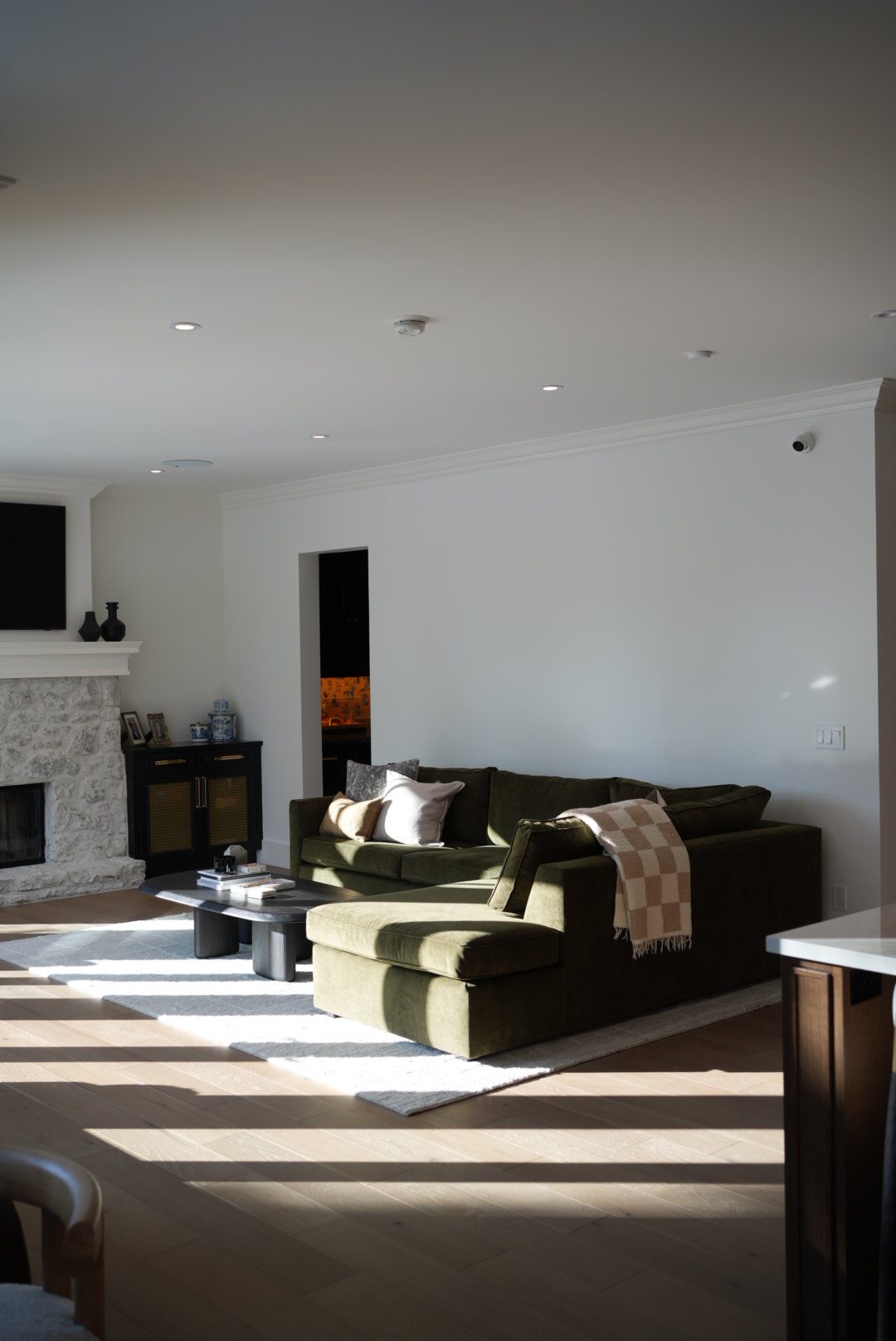 A bright, calm living room bathed in afternoon light